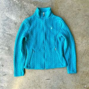 Spyder teal women’s zip cable knit fleece sweater jacket.